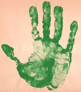 green hand print with poster paint
